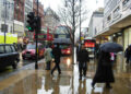 Iliustracija: Oxford Street in the Rain A sudden downpour has shoppers dashing for cover. Looking along the north side of Oxford St…
